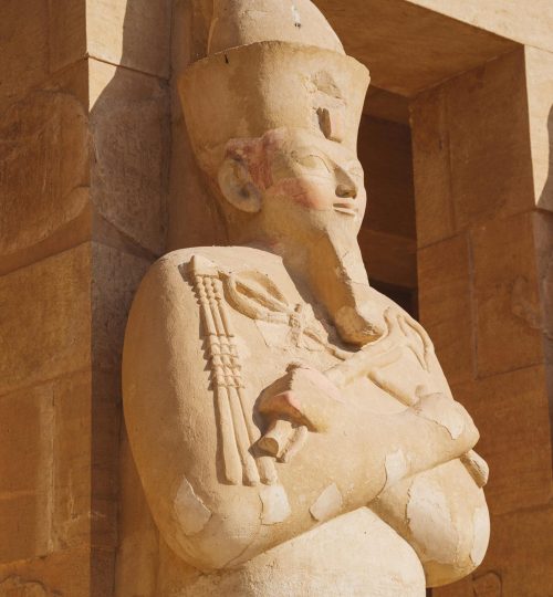 Historic statue in Luxor, Egypt, showcasing ancient Egyptian art and culture.